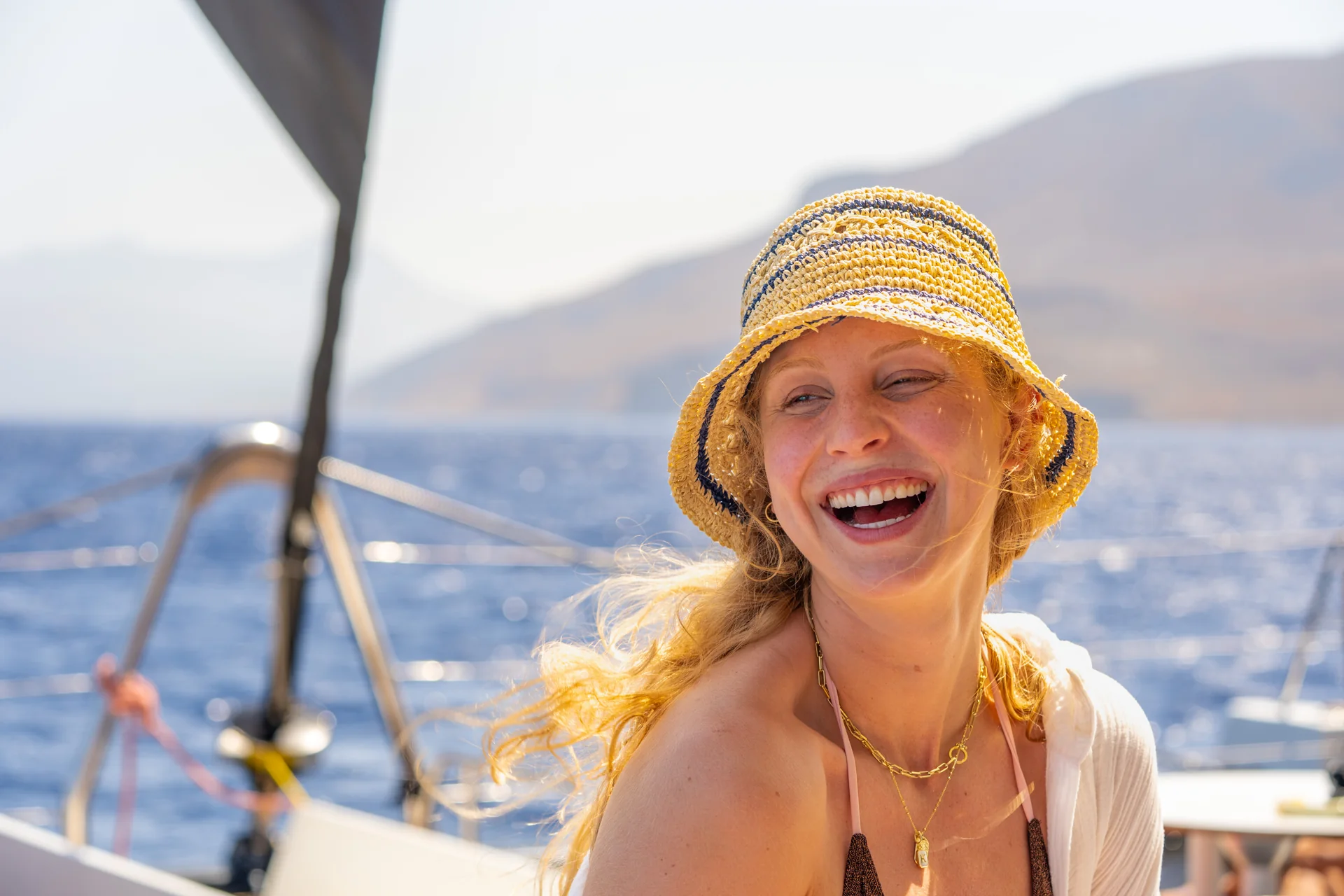 Guest enjoying a sunny cruise aboard a DanEri yacht