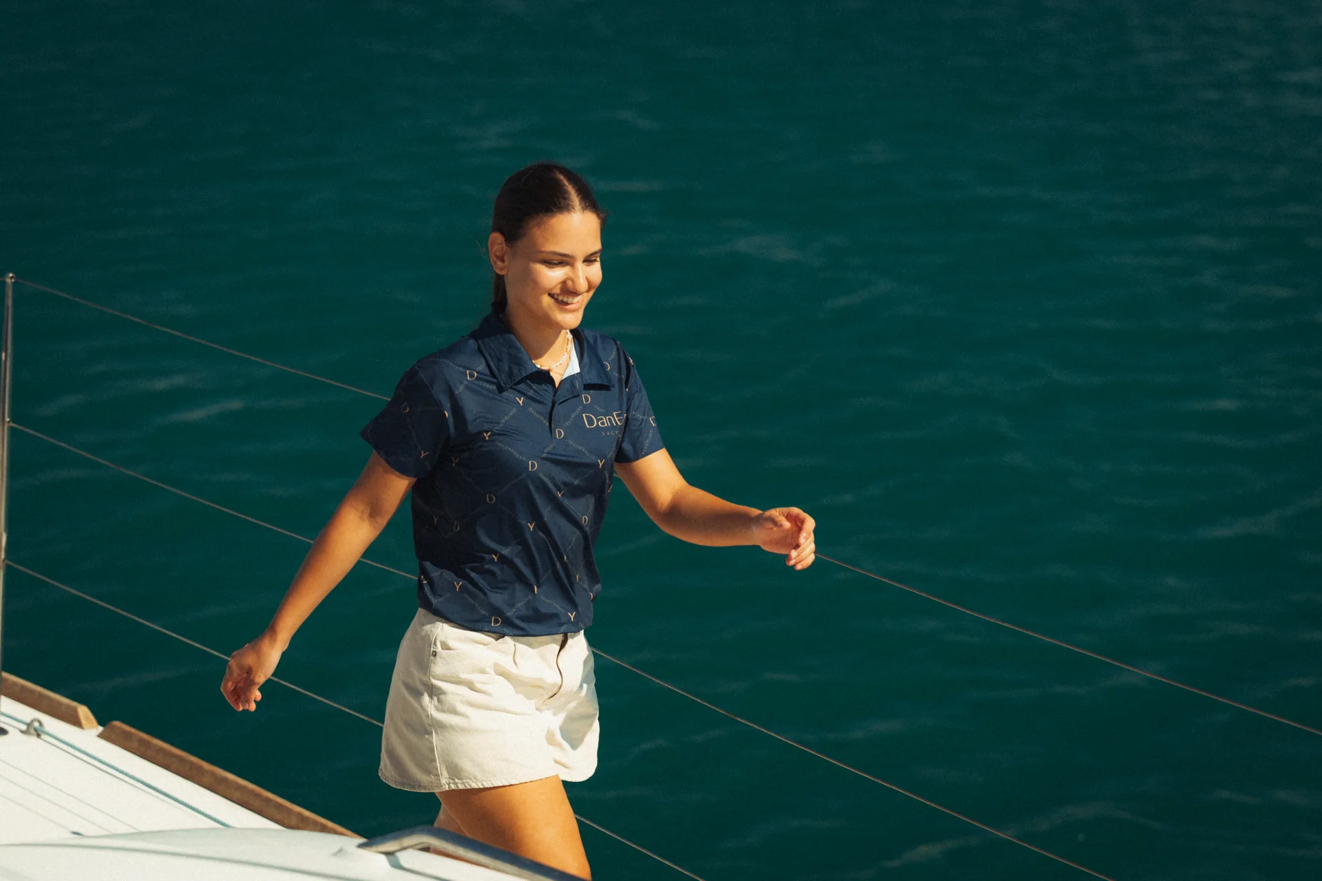 DanEri crew member on a catamaran deck