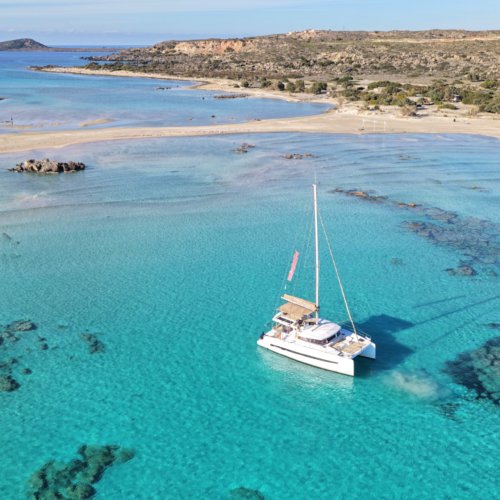 Luxury catamaran anchored at Elafonisi, Crete