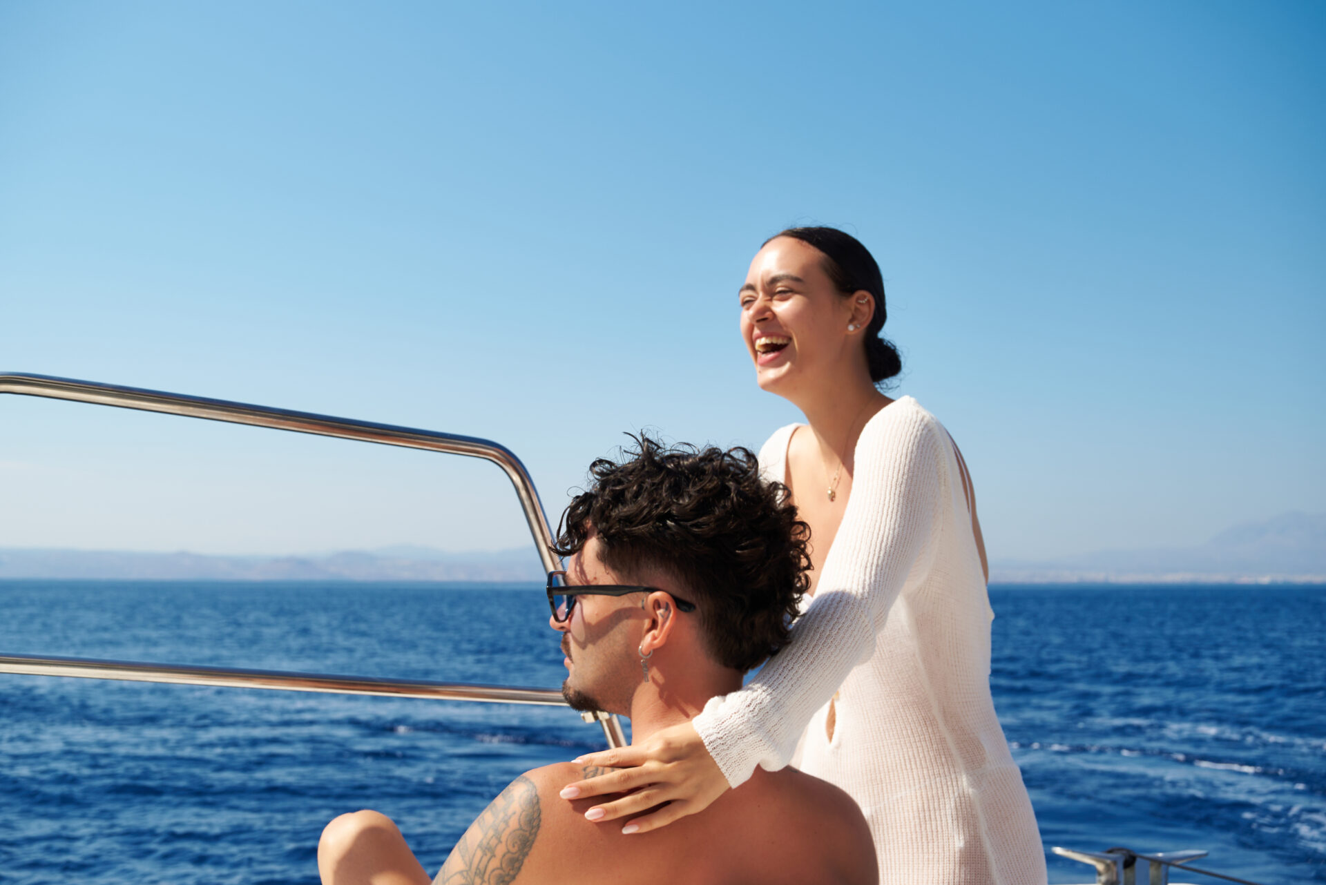 Catamaran sailing in Crete during golden September light