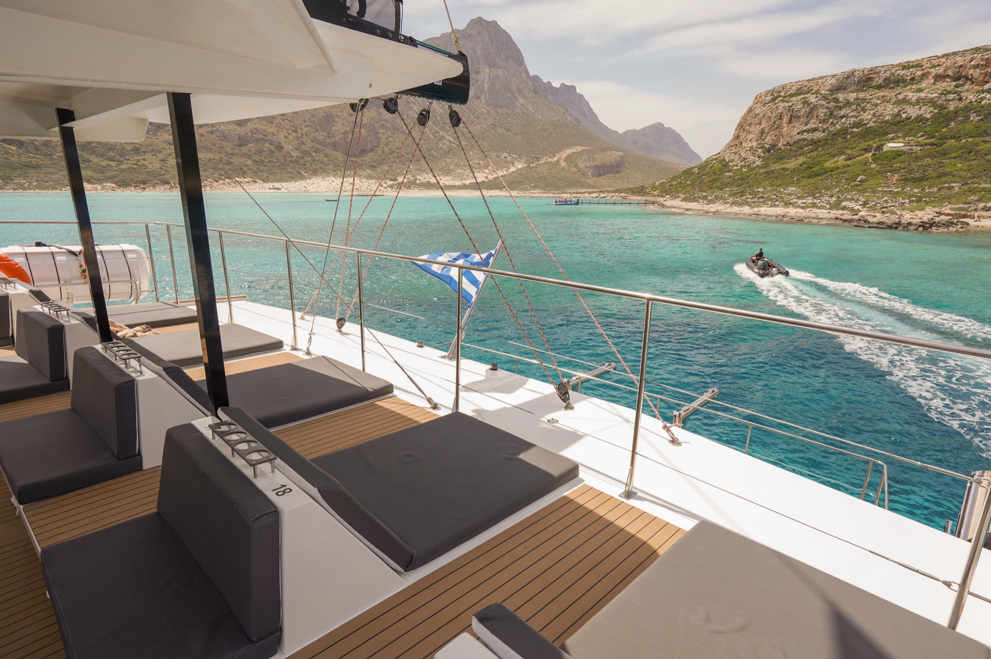 The DanEri catamaran deck over the turquoise Balos lagoon, the headline beach of the Chania region