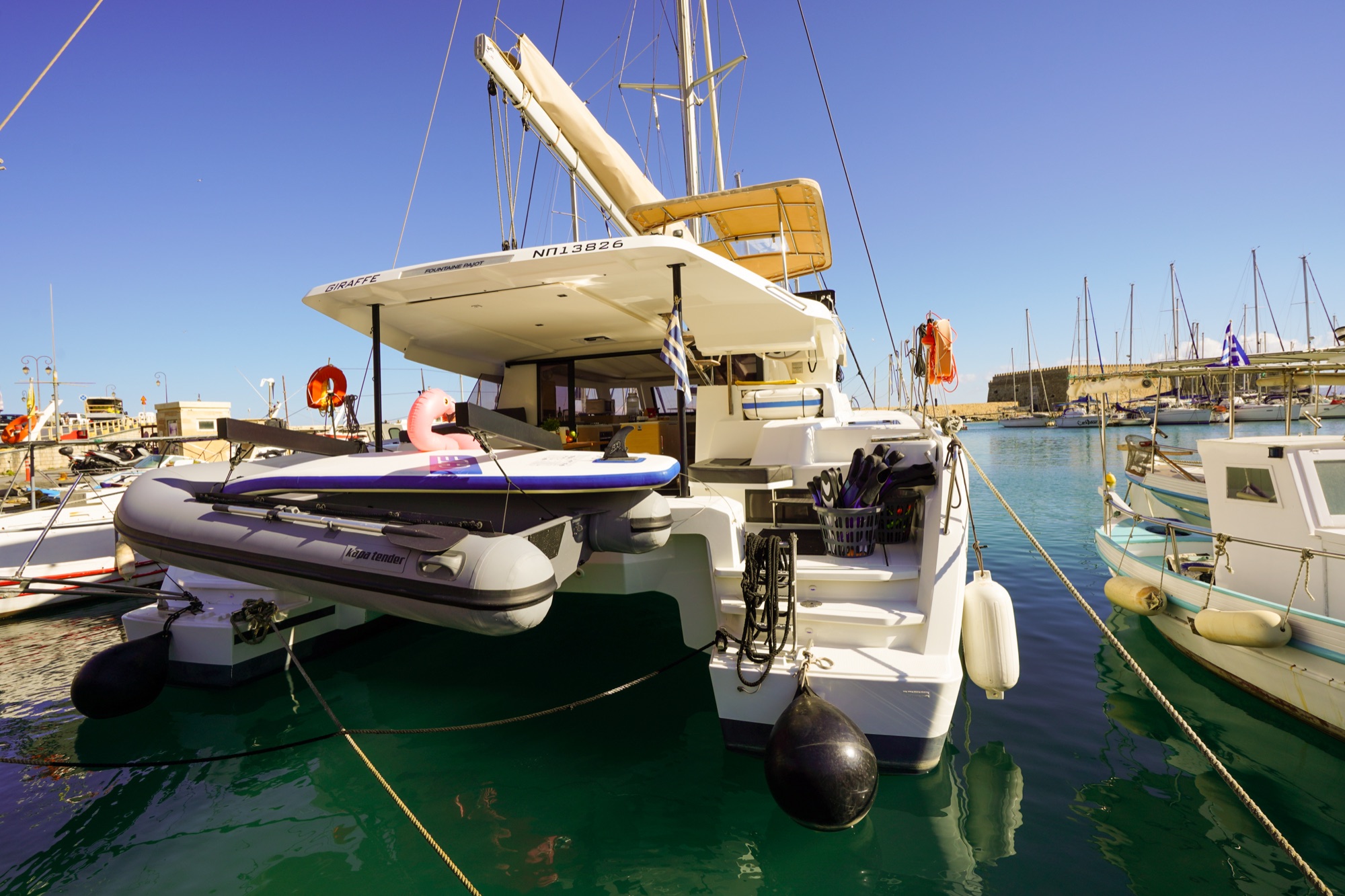A DanEri catamaran in Heraklion's Venetian harbour below the Koules fortress