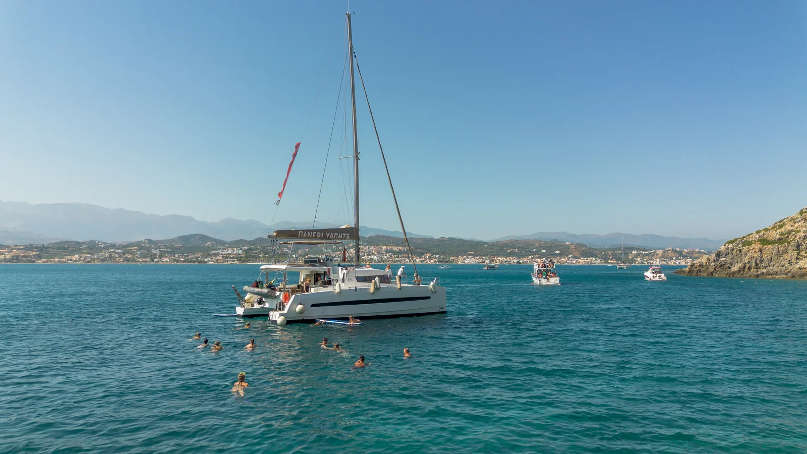 Catamaran sailing off the Chania coast