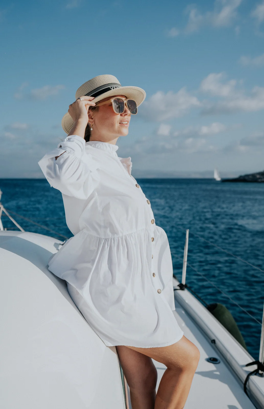Guest enjoying the sea aboard a Chania catamaran