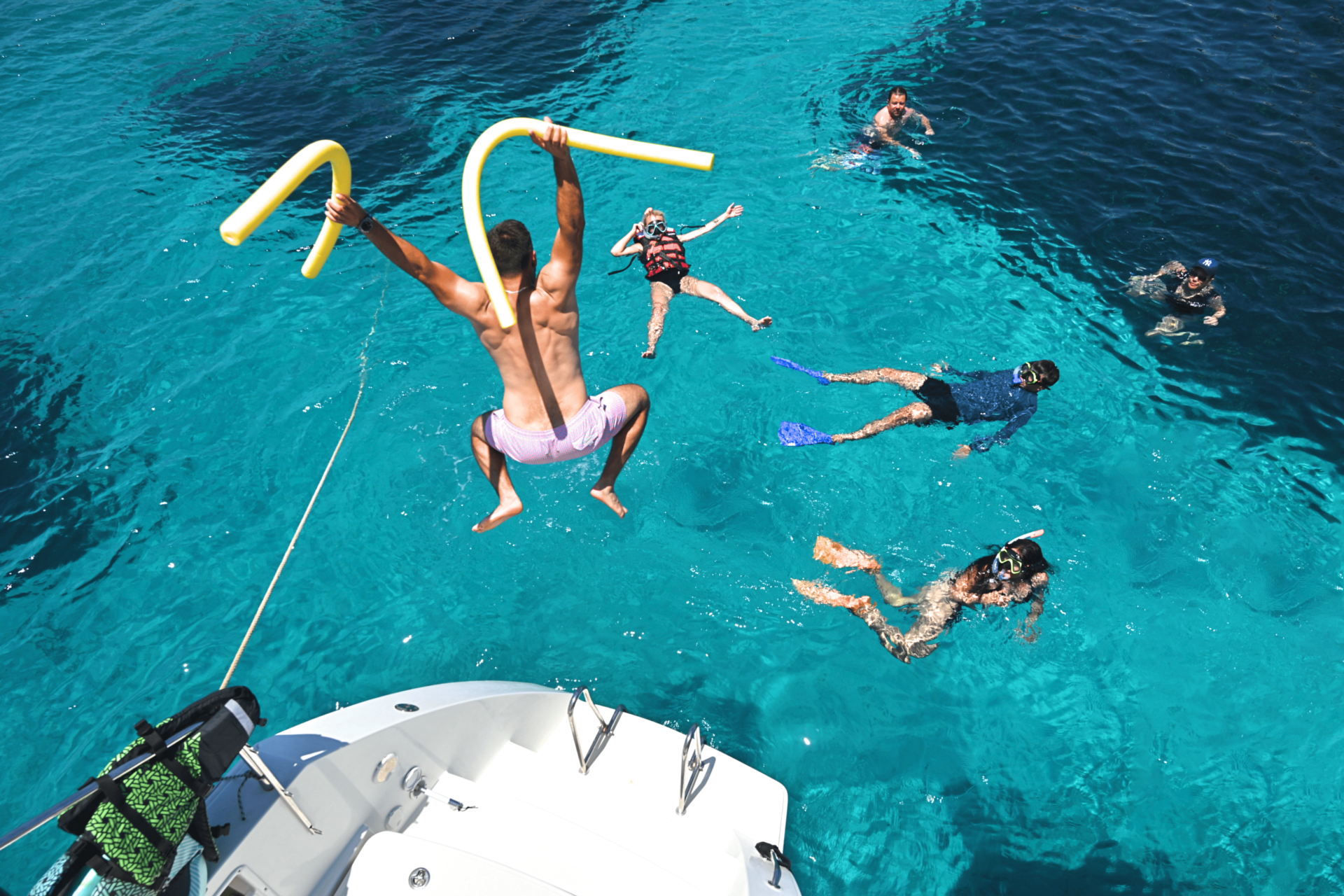 DanEri crew and guests relaxing on deck on the Rhodes day cruise